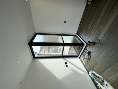 Black aluminium box bay window in London loft room