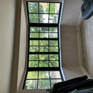 Tall black aluminium Crittall-style window, London dressing room
