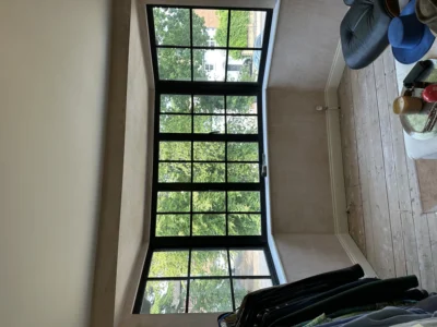 Tall black aluminium Crittall-style window, London dressing room