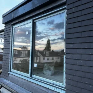 Anthracite aluminium window on London loft dormer exterior