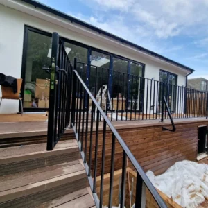 Anthracite aluminium sliding doors and railings, London extension