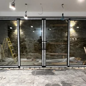 Black aluminium bifold doors installed in London property