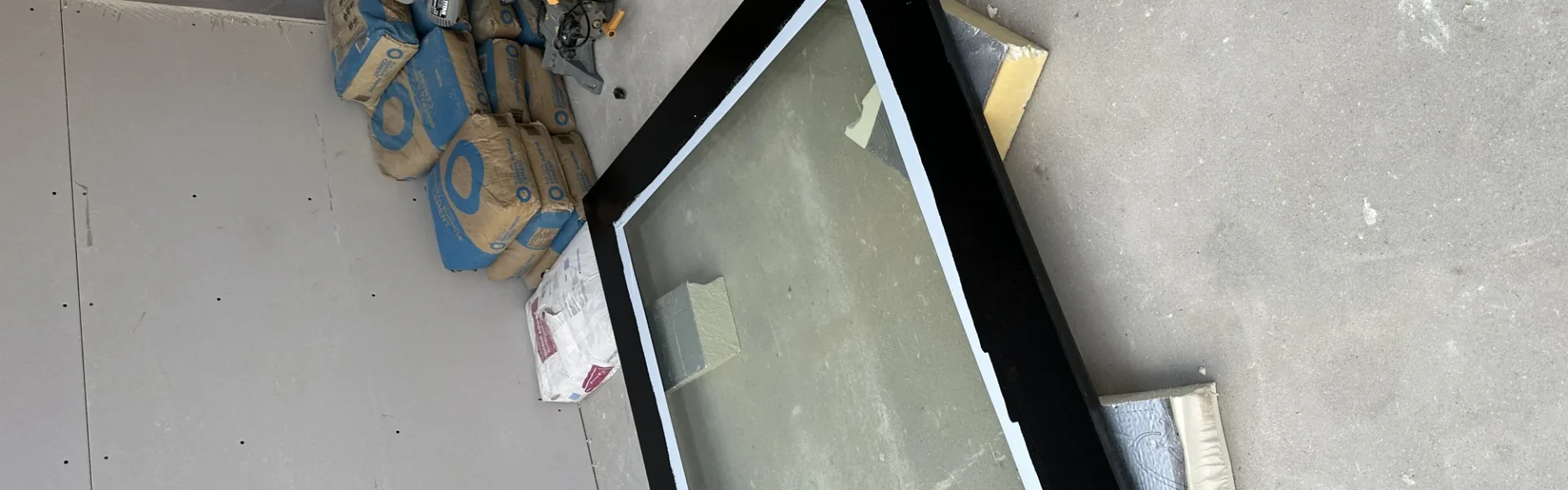 Sealed glazed units awaiting installation in London workshop