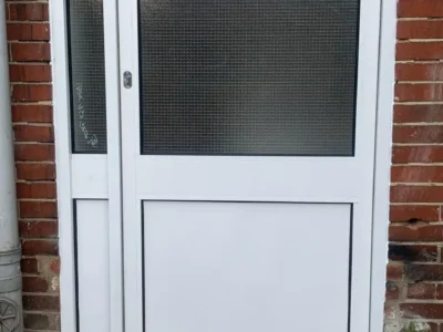 White uPVC glazed utility door installation, London