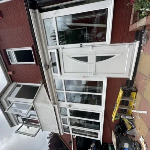 White uPVC front door and side panels, London house exterior