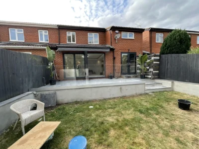 Anthracite bifold and French doors on London terraced house rear