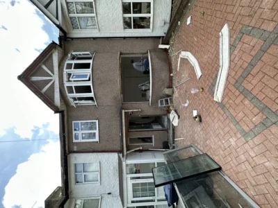 London house rear with bay window mid glazing installation