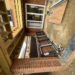 London rear extension with new white uPVC window and steelwork