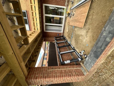 London rear extension with new white uPVC window and steelwork