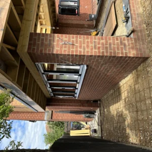 Brick rear extension with aluminium glazing, London build