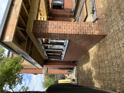 Brick rear extension with aluminium glazing, London build