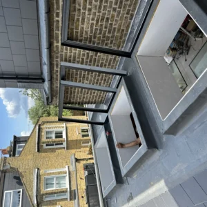 London rear extension with anthracite aluminium windows being fitted