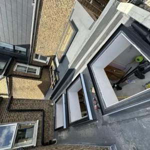 London rear extension with grey aluminium windows, rooftop view