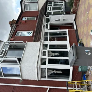 London house with white uPVC bay windows and porch