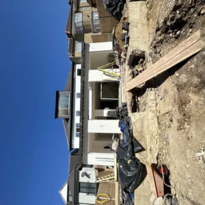 New build London property exterior during construction with new windows