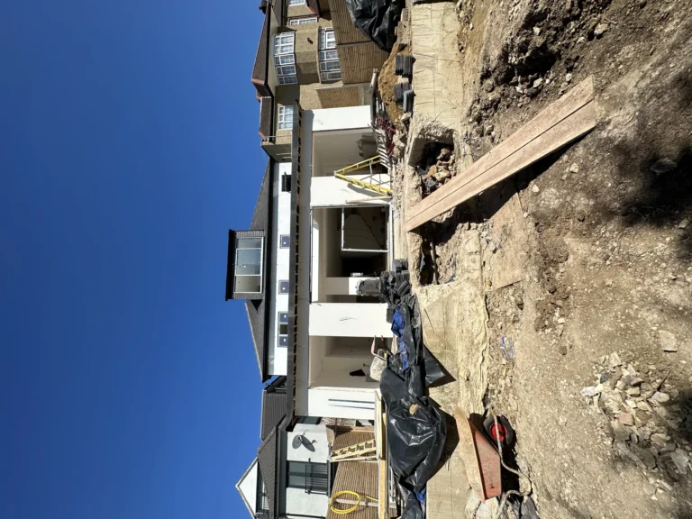 New build London property exterior during construction with new windows