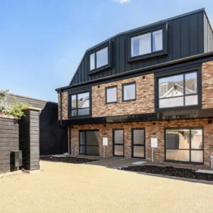 New London townhouses with grey aluminium windows and doors