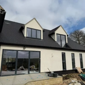New build home with grey bifold doors, London