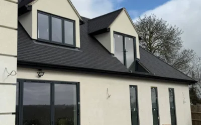 Rear of new build house with anthracite glazing, London