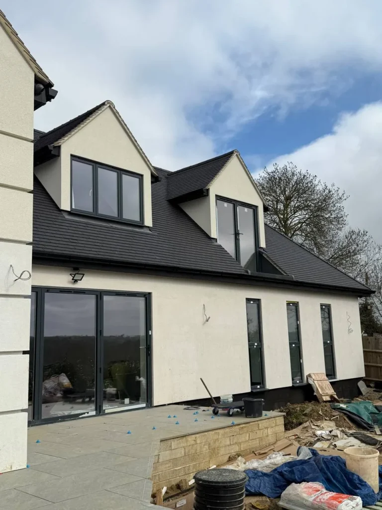 Rear of new build house with anthracite glazing, London