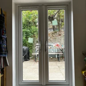 White uPVC French doors installed in London home interior