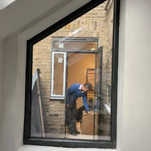Glass balustrade over mezzanine in modern London home