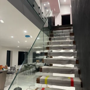 Frameless glass staircase balustrade in London new build