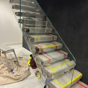 Frameless glass balustrade on floating London staircase