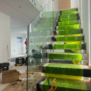 Glass staircase balustrade installed in London home