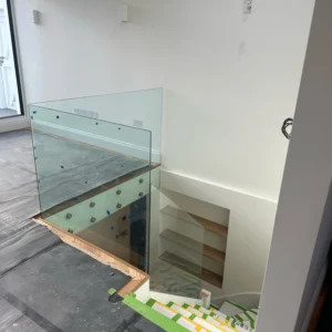 Frameless glass landing balustrade in London property