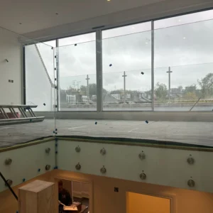 Frameless glass balustrade and curtain wall, London home