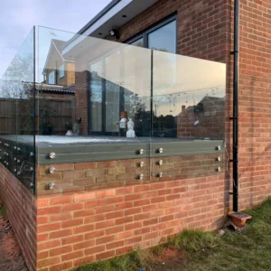 Frameless glass balustrade on London brick terrace
