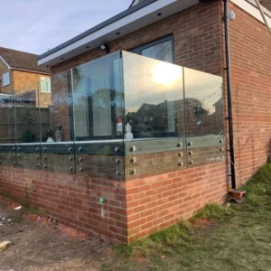 Frameless glass terrace balustrade, London garden