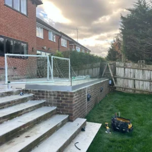Frameless glass balustrade on raised patio steps, London