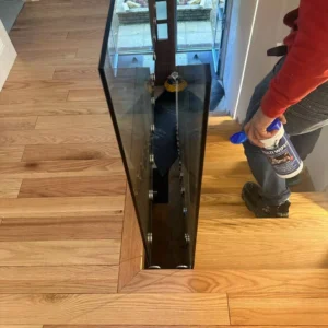 Glass balustrade panel on staircase landing, London