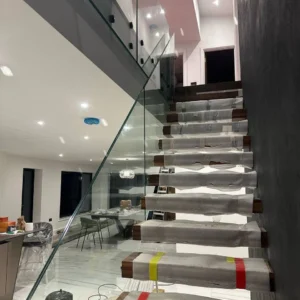Frameless glass staircase balustrade in London home