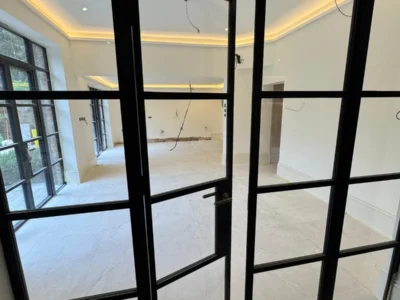 Black Crittall-style glass partition door, London internal glazing