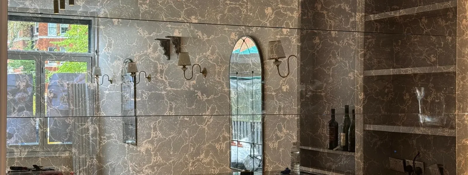Bronze mirrored splashback wall London bespoke glazing