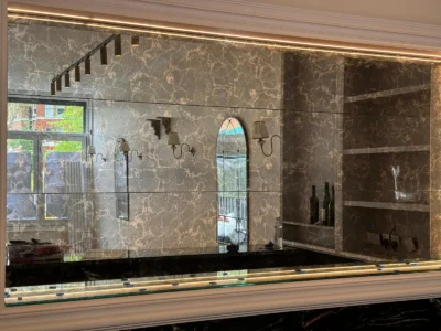Bronze mirrored splashback wall London bespoke glazing