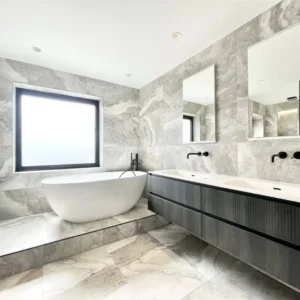 Bathroom wall mirrors above twin vanity, London