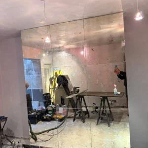 Antique-style mirror wall panels installed, London