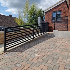 Black metal driveway sliding gate London property