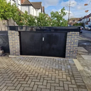 Black metal double driveway gates London property