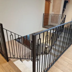 Black metal staircase balustrade London interior