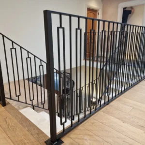 Black metal stair balustrade London interior landing