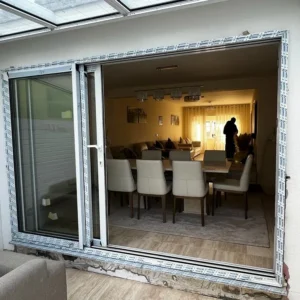 Aluminium sliding patio doors to London conservatory dining room
