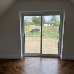 White sliding patio door from interior, London home