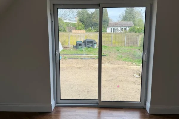 White sliding patio door from interior, London home
