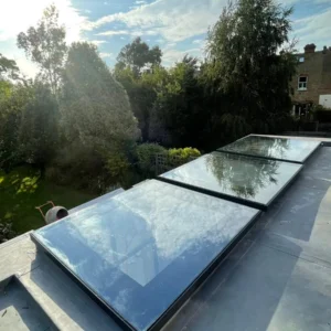 Twin glass rooflights on London flat-roof rear extension