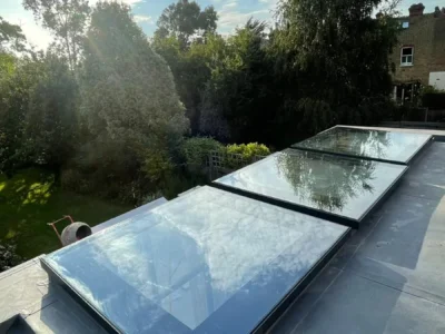Twin glass rooflights on London flat-roof rear extension